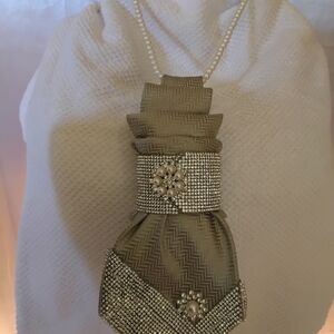 Elegant Gold Evening Bag with Pearl Accents